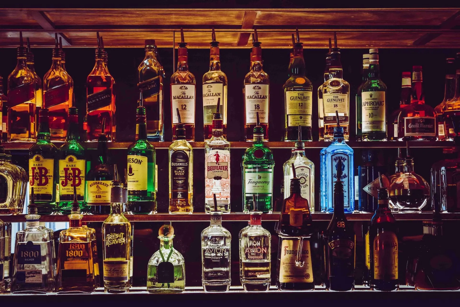 Spirits on a back bar shelf in a licensed venue - PC Licensing Consultancy